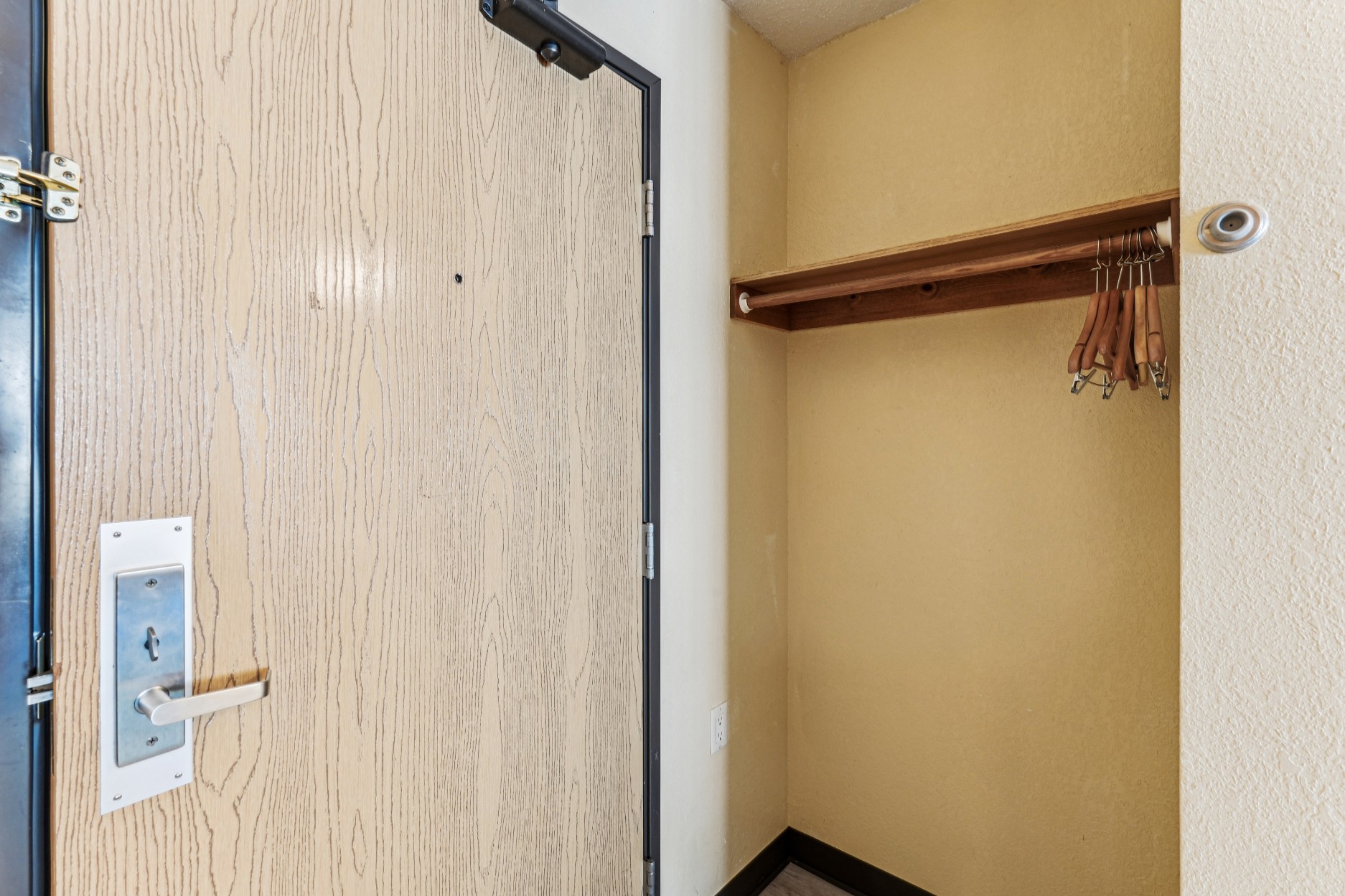 Entryway clothing storage in an apartment at The House
