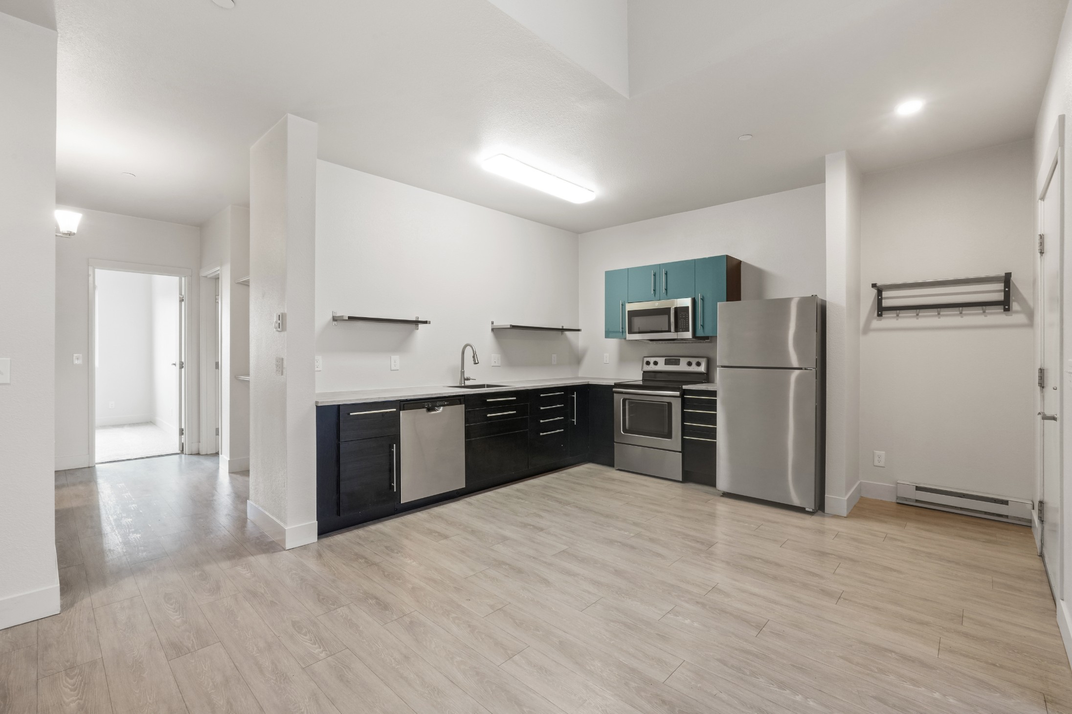 Kitchen and living room of an apartment with modern finishes at Red Table