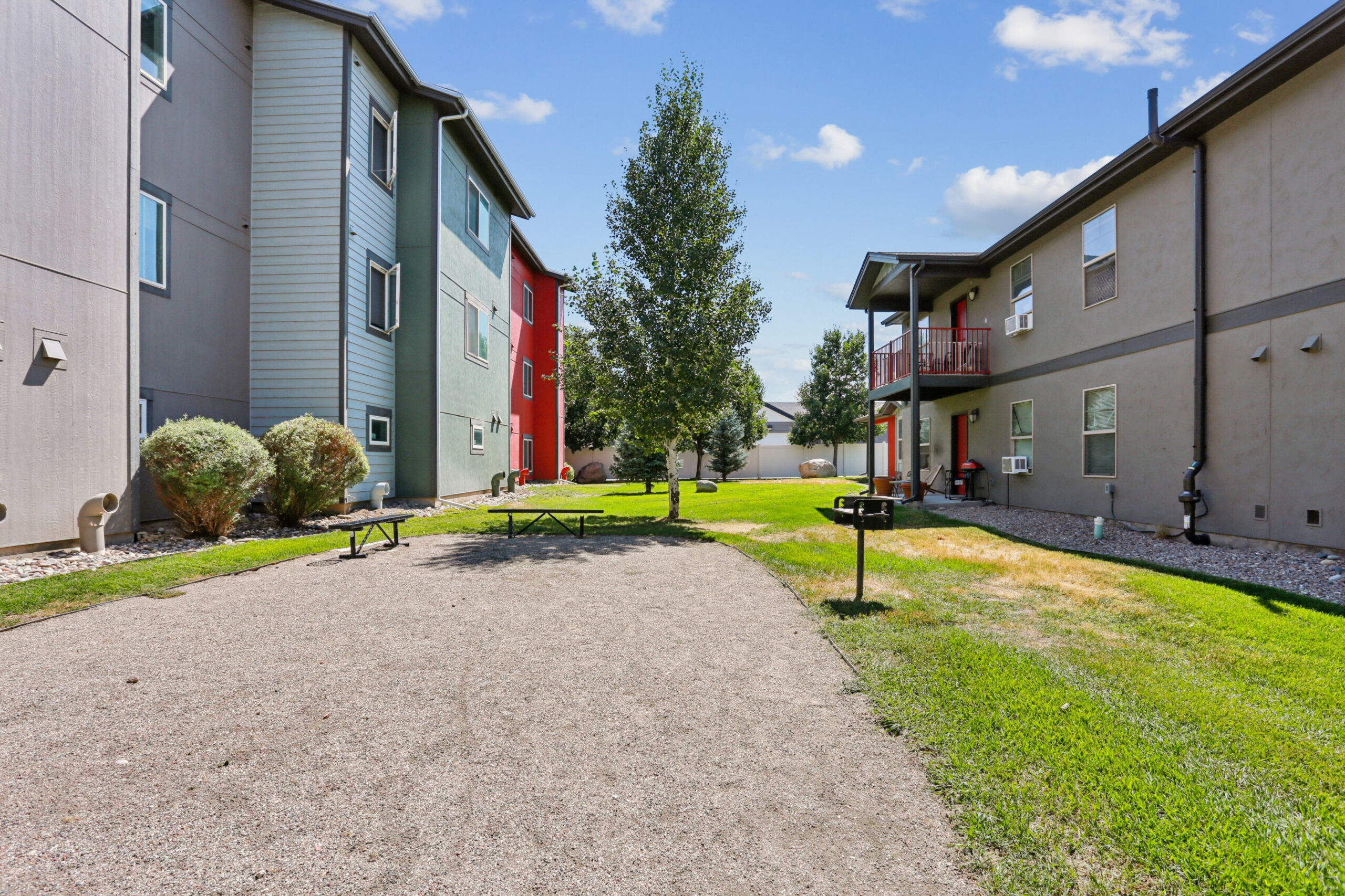 Courtyard and grill at Red Table Apartments