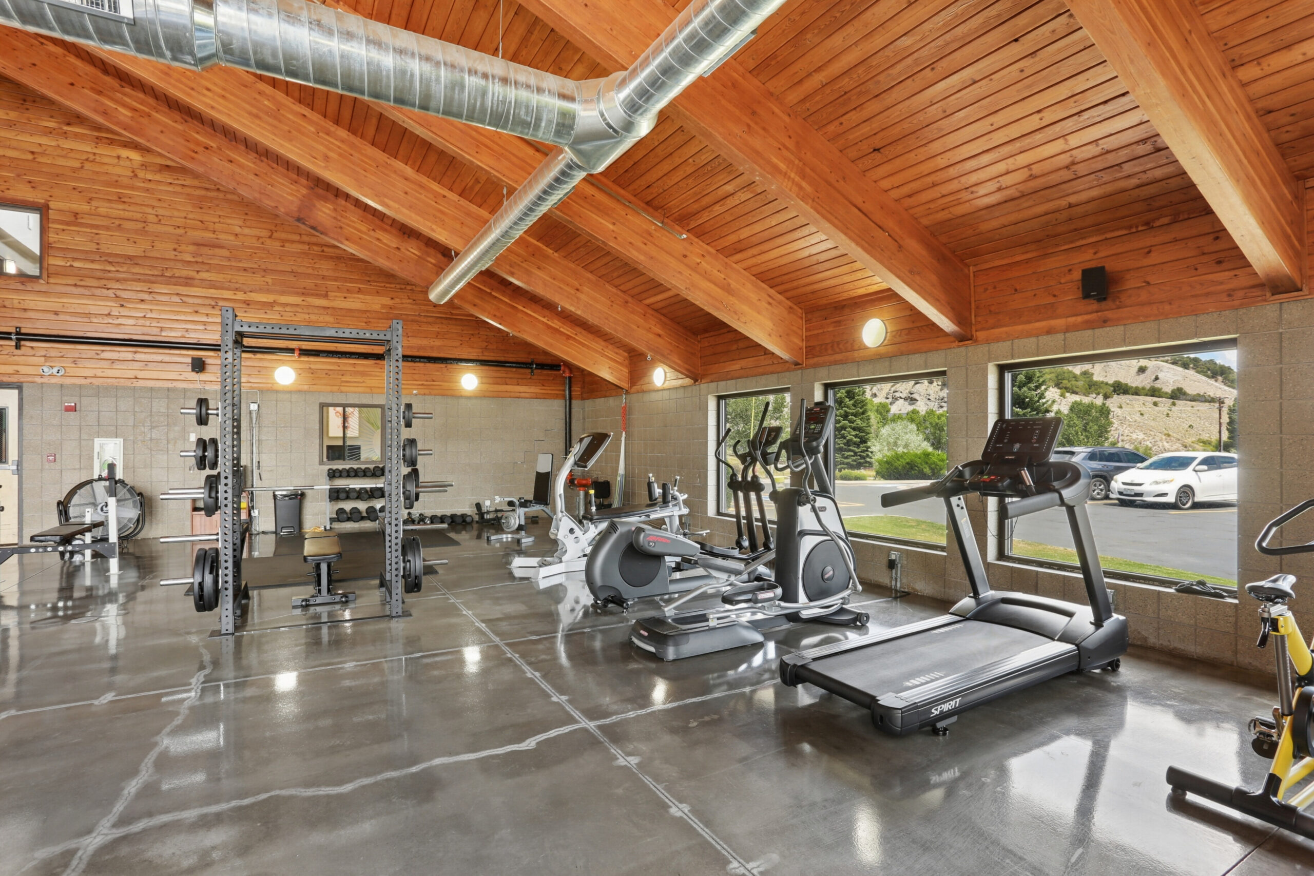 Fitness center with cardio equipment and weight training area