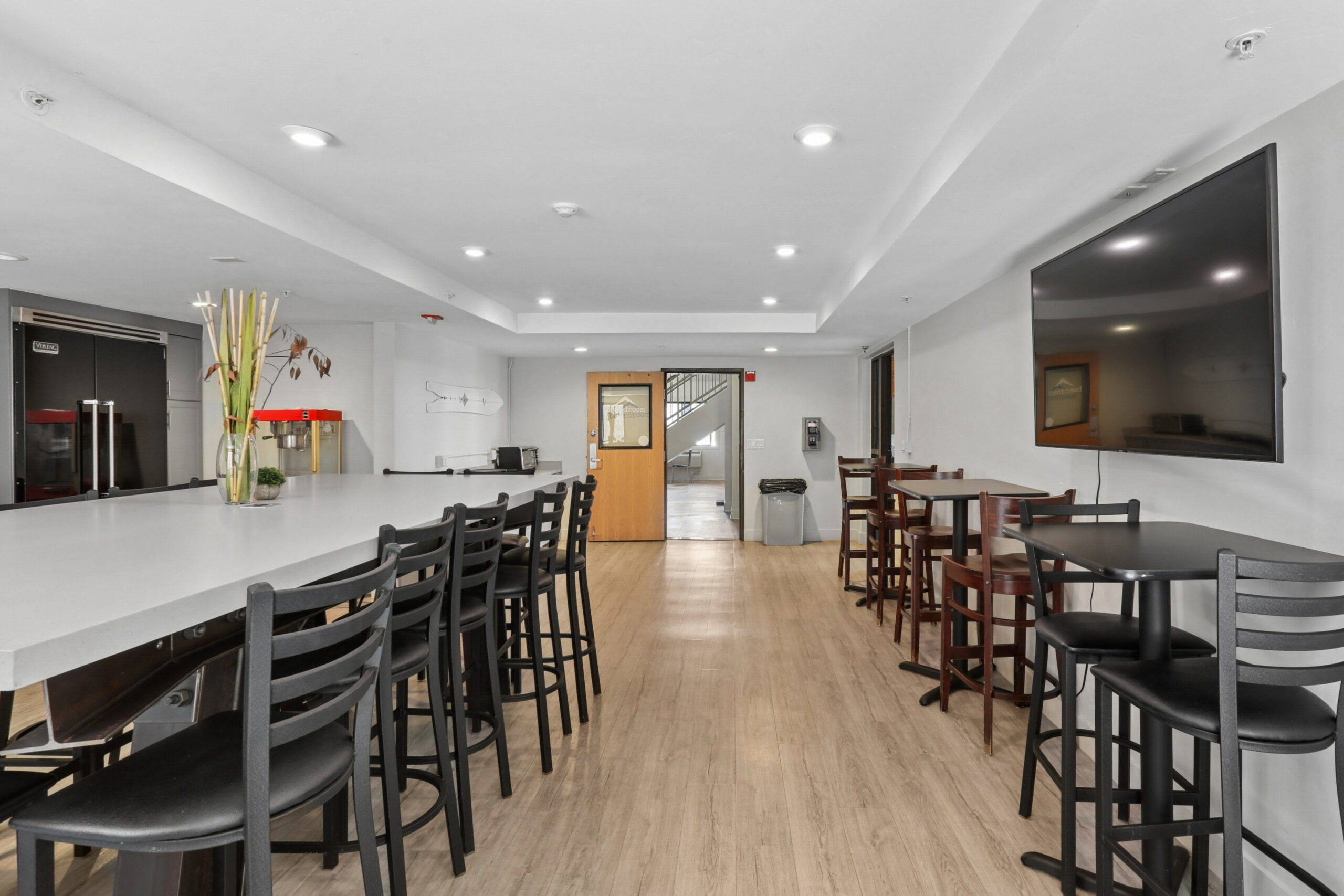 Media lounge and community kitchen at The House apartments
