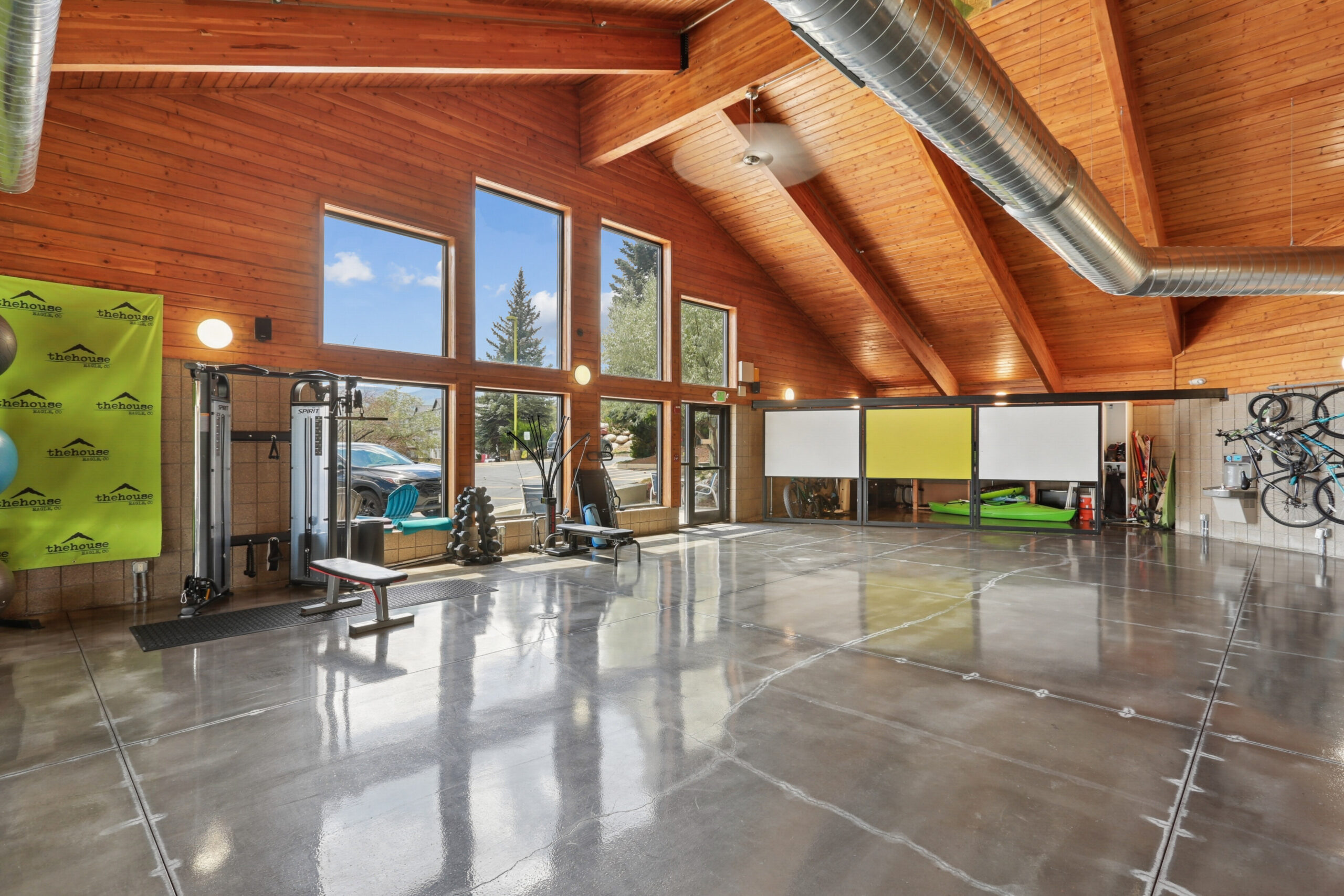 Fitness center with cable machine and gear storage
