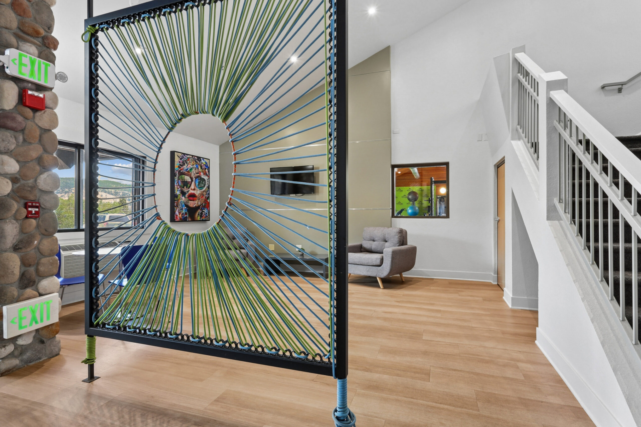 Clubhouse social lounge with artwork