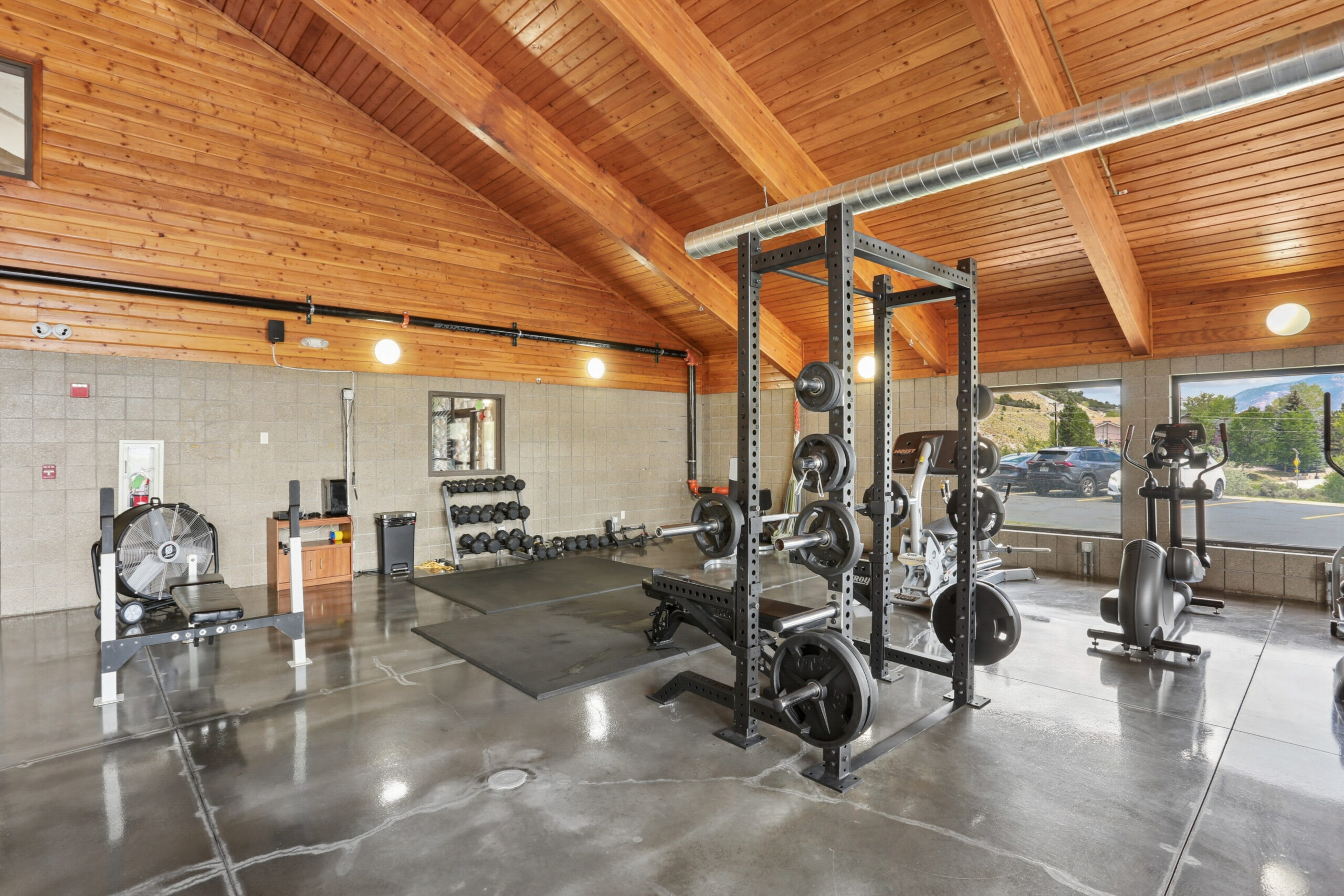 Cardio and strength training equipment at The House fitness center