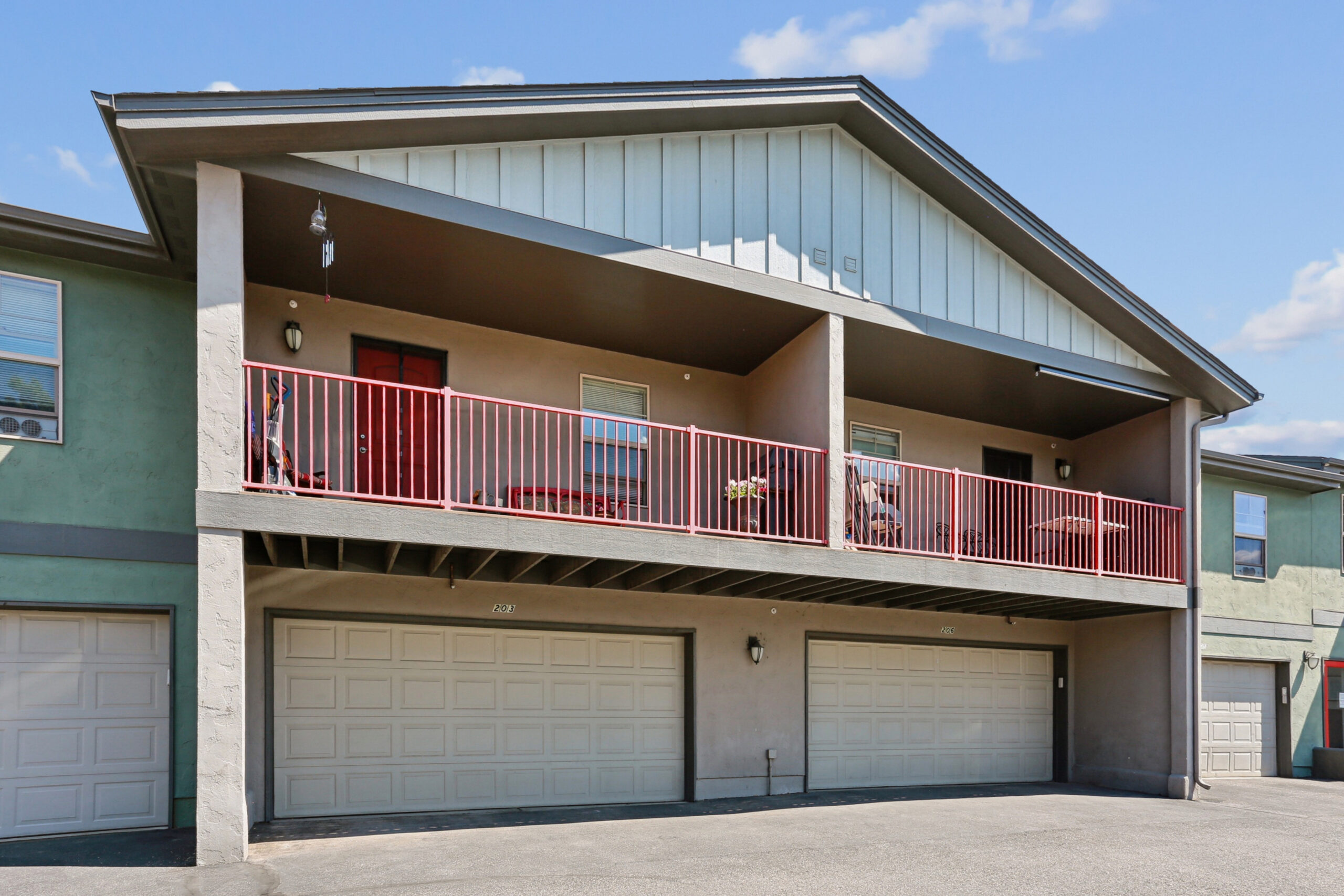 Residential balconies above private garages