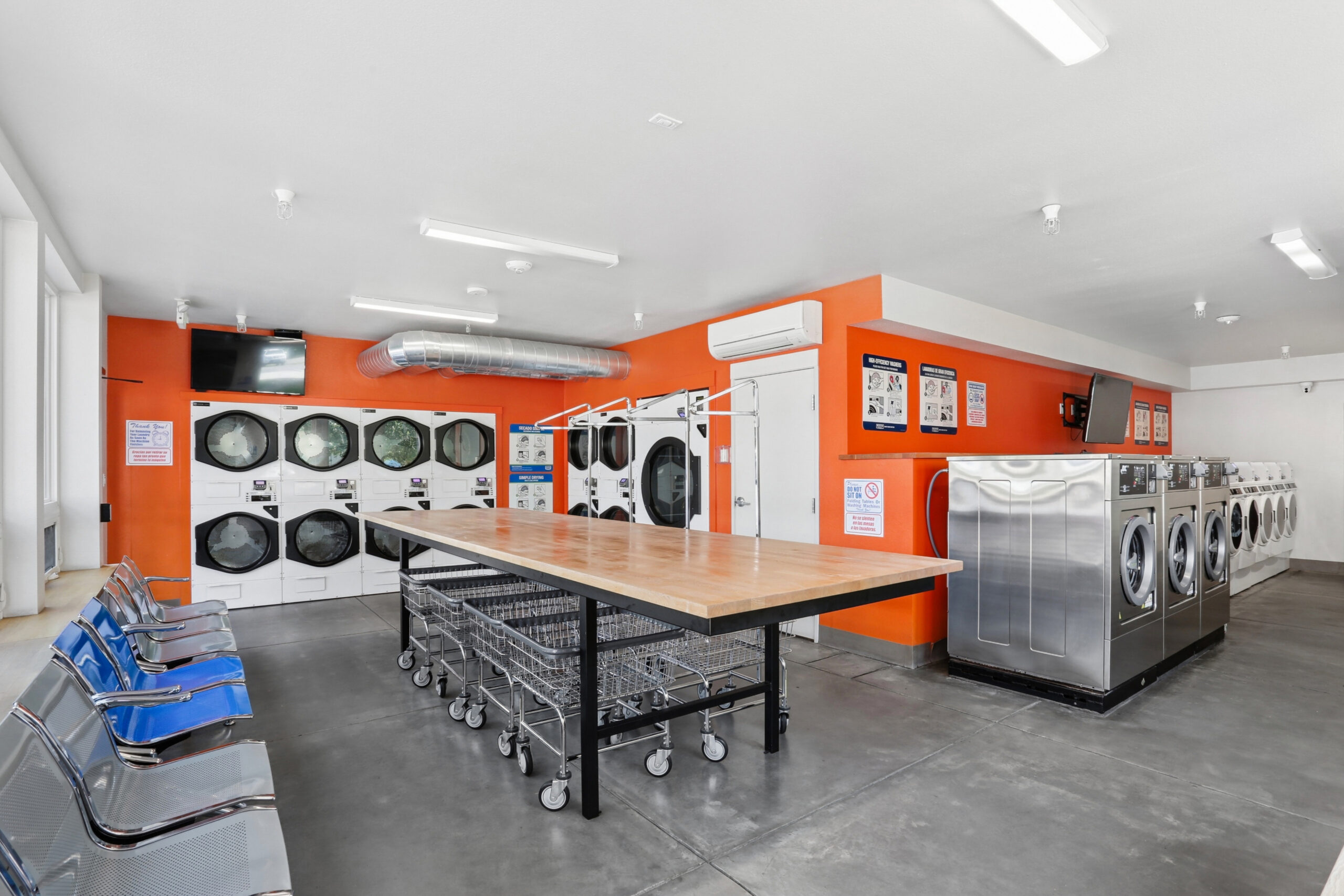 Shared on-site laundry facility with folding table