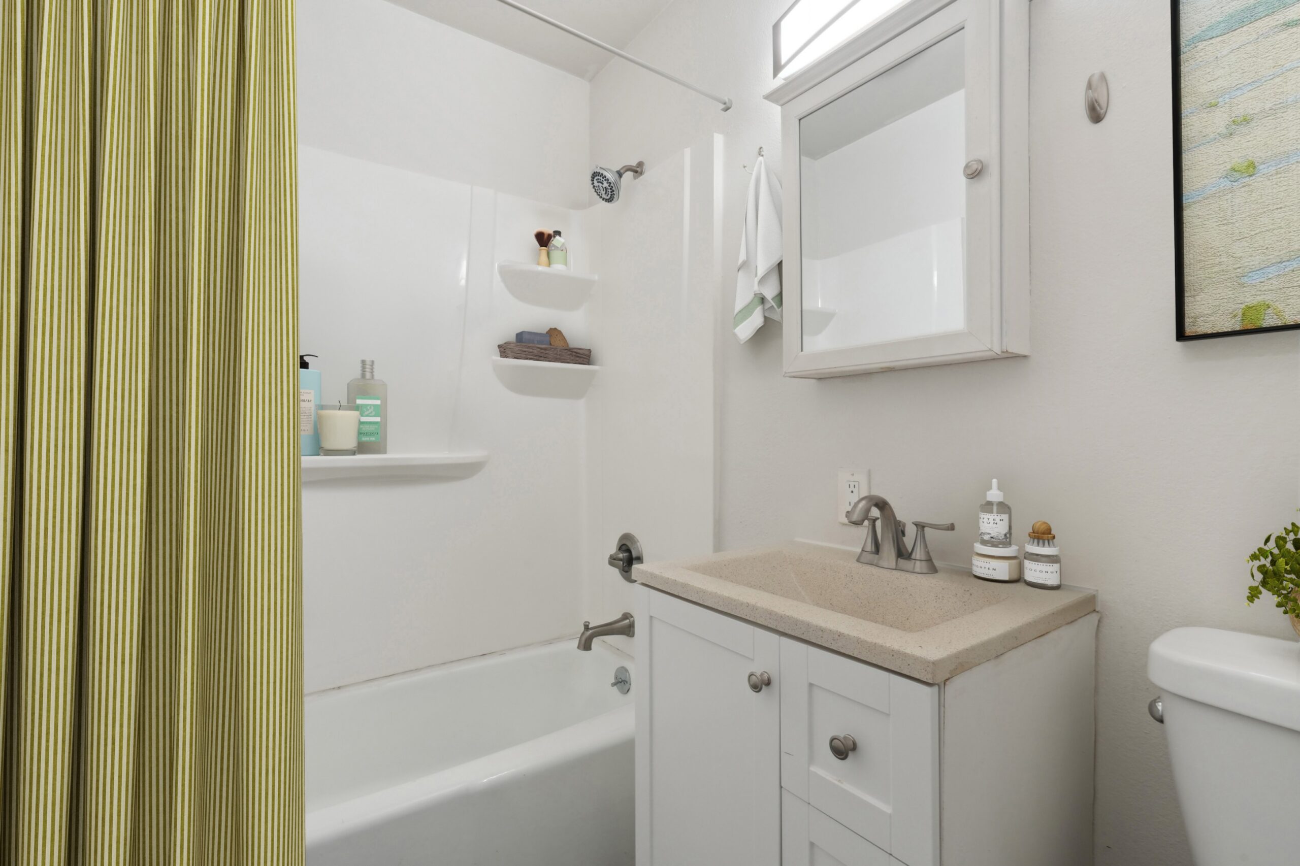 Bathroom with tub/shower combination at Flats on 2nd